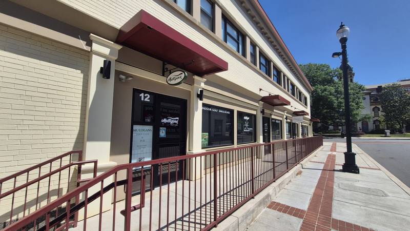 Mulligans Golf Club storefront Barbrick Ave downtown Concord NC