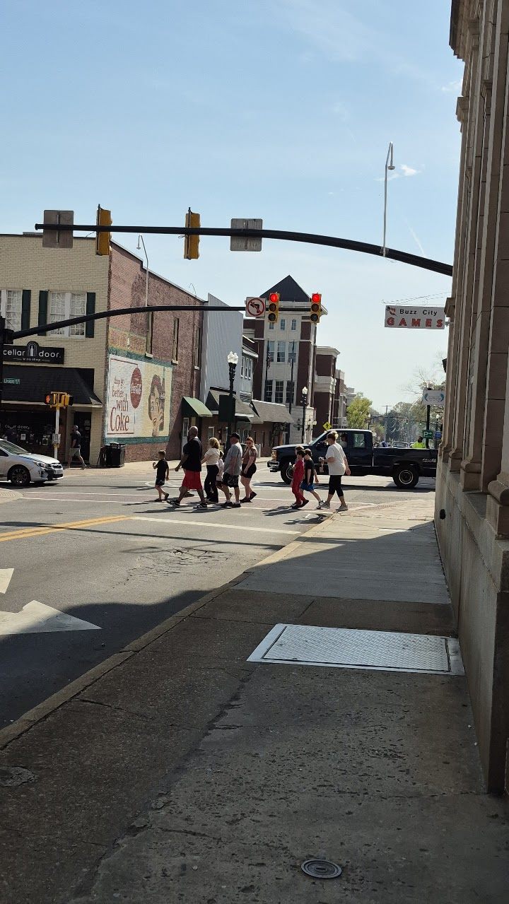 Union Cabarrus Ave corner people downtown Concord NC